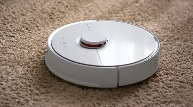 Robot vacuum Cleano on a carpeted floor
