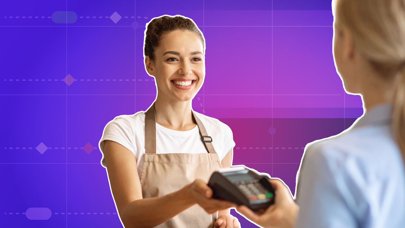 A customer and service person are interacting via a payment transaction (credit card terminal).